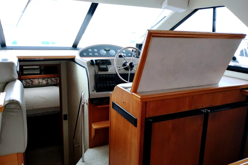 Slide: The Image of Interior of 1995 Bayliner 3988 Motoryacht showing helm and cabin entrance. - 34