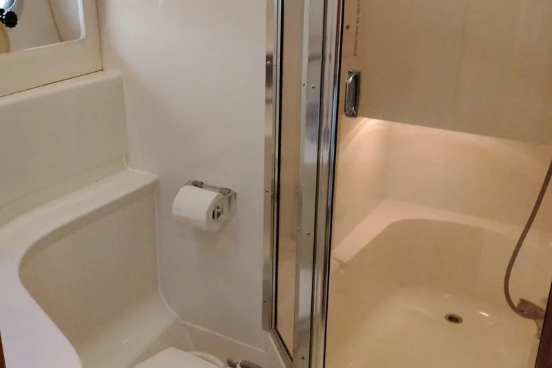 Slide: The Image of Bathroom interior of 1995 Bayliner 3988 Motoryacht with shower and toilet. - 41
