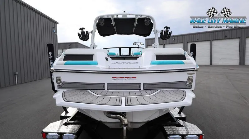 Slide: The Image of 2024 Nautique GS22 boat at Race City Marine dealership. - 13