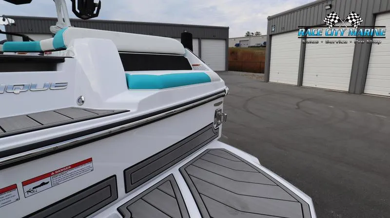Slide: The Image of 2024 Nautique GS22 boat at Race City Marine dealership. - 27