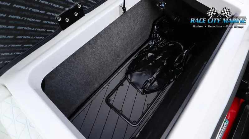 Slide: The Image of 2024 Nautique GS22 storage compartment at Race City Marine. - 30