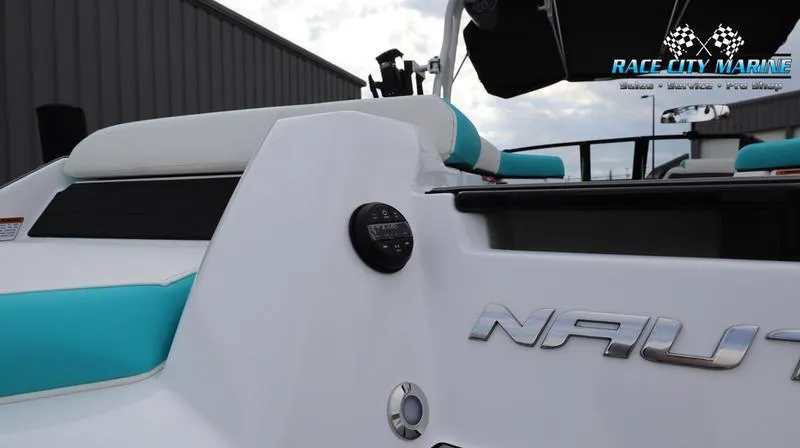 Slide: The Image of 2024 Nautique GS22 boat at Race City Marine dealership. - 33