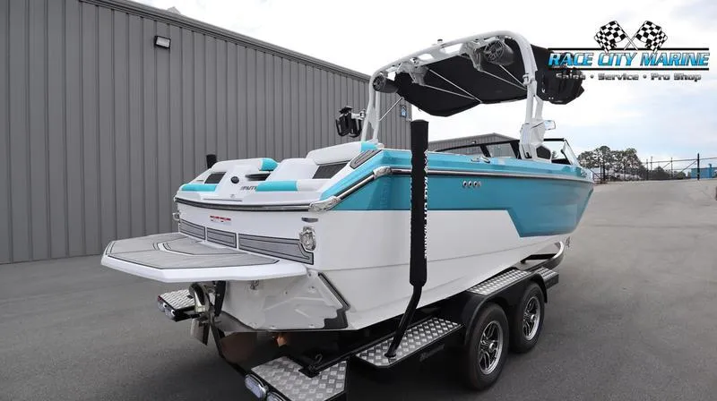 Slide: The Image of 2024 Nautique GS22 boat on trailer at Race City Marine. - 38