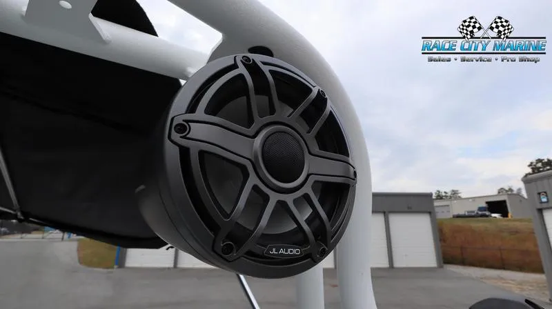 Slide: The Image of Close-up of JL Audio speaker on 2024 Nautique GS22 boat at Race City Marine. - 41
