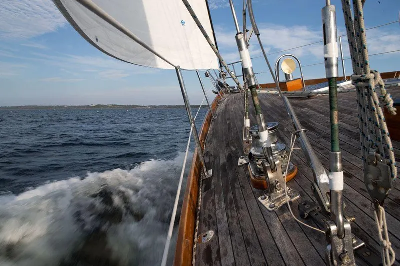 Slide: The Image of Sailing on a 1997 Hinckley OceanCruising 52 yacht, cutting through ocean waves. - 24