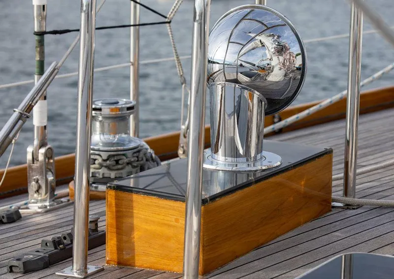 Slide: The Image of Hinckley OceanCruising 52 yacht deck detail, featuring polished metal and wood elements, 1997 model. - 30