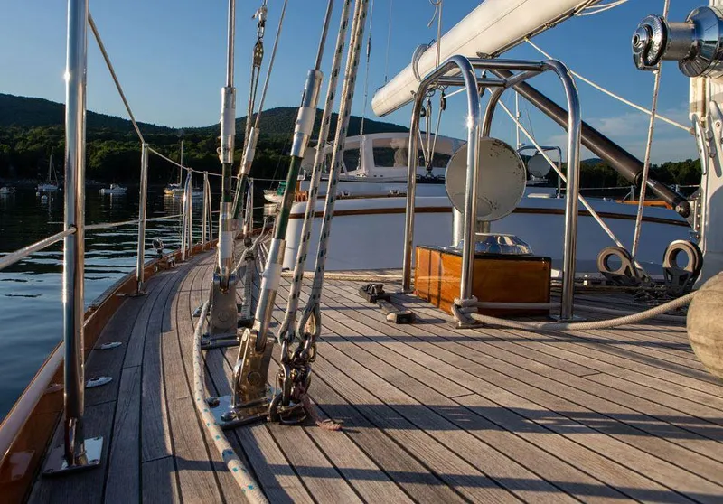 Slide: The Image of Deck view of 1997 Hinckley OceanCruising 52 yacht, with rigging and scenic background. - 31
