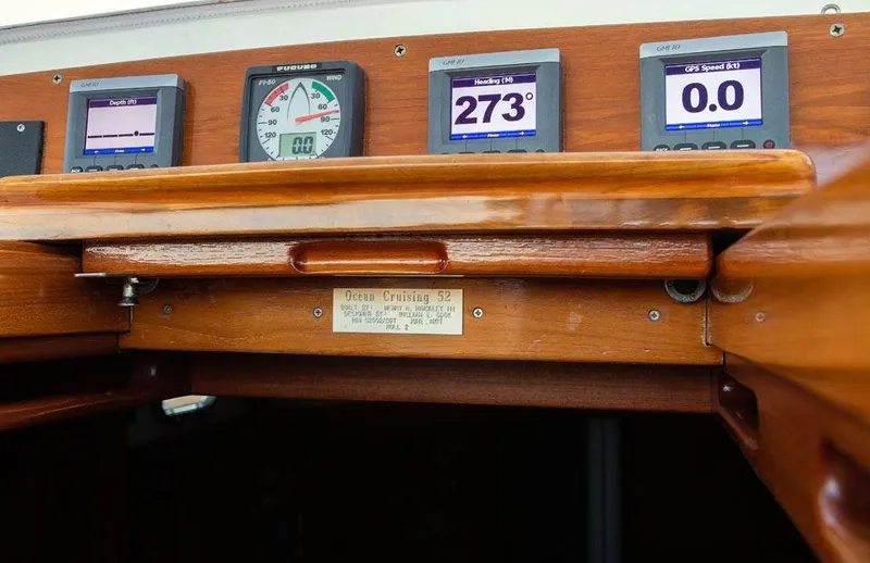 Slide: The Image of Hinckley OceanCruising 52 yacht dashboard with navigation instruments, 1997 model. - 44