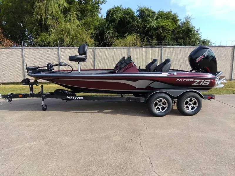 Slide: The Image of 2024 Nitro Z18 fishing boat on trailer, side view. - 1