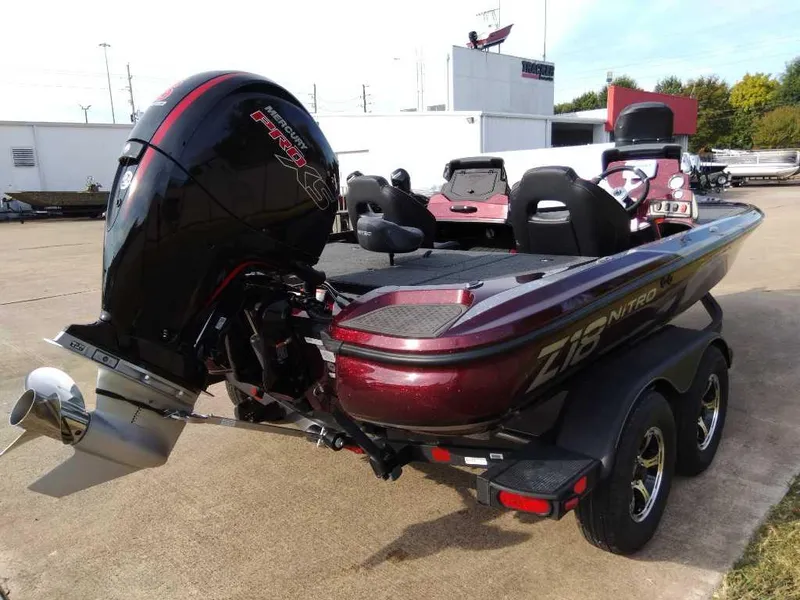 Slide: The Image of 2024 Nitro Z18 boat with powerful outboard motor on trailer. - 4