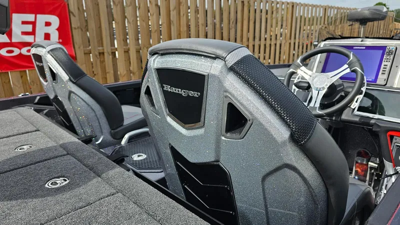 Slide: The Image of 2024 Ranger Z521R Ranger Cup Equipped boat interior with dual seats and steering console. - 17