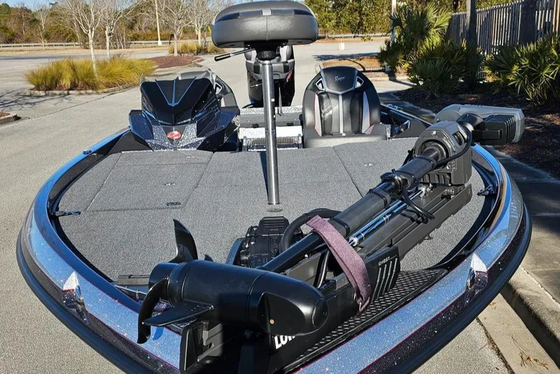 Slide: The Image of 2024 Ranger Z521R Ranger Cup Equipped boat with advanced fishing gear on deck. - 4