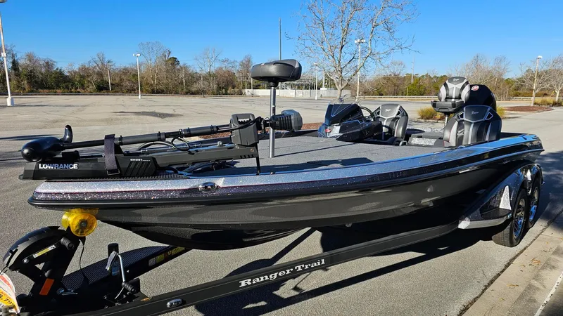 Slide: The Image of 2024 Ranger Z521R Ranger Cup Equipped boat on trailer in parking lot. - 6