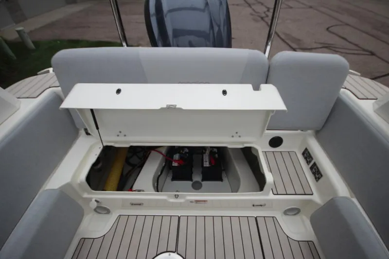 Slide: The Image of 2024 Zodiac Medline 7.5 NEO boat interior with open storage compartment. - 14