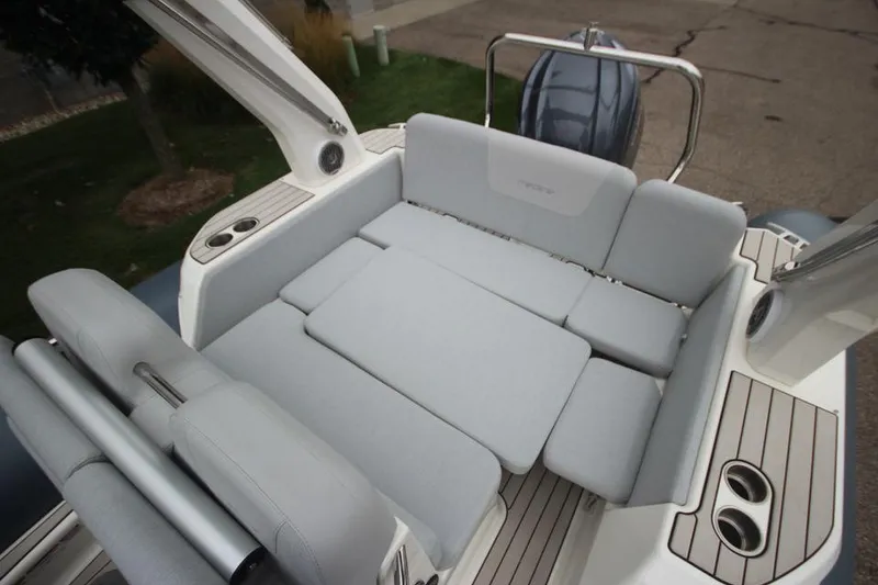 Slide: The Image of 2024 Zodiac Medline 7.5 NEO boat interior with cushioned seating and modern design. - 17