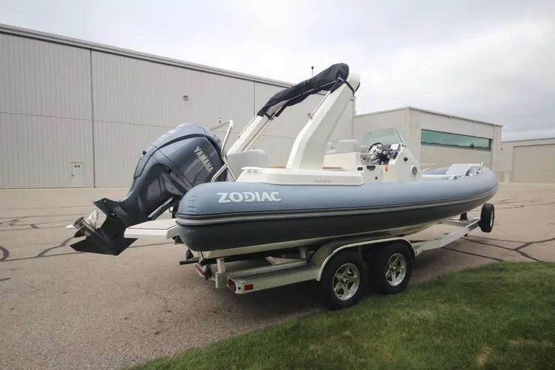 Slide: The Image of 2024 Zodiac Medline 7.5 NEO boat with 300hp engine on trailer. - 4