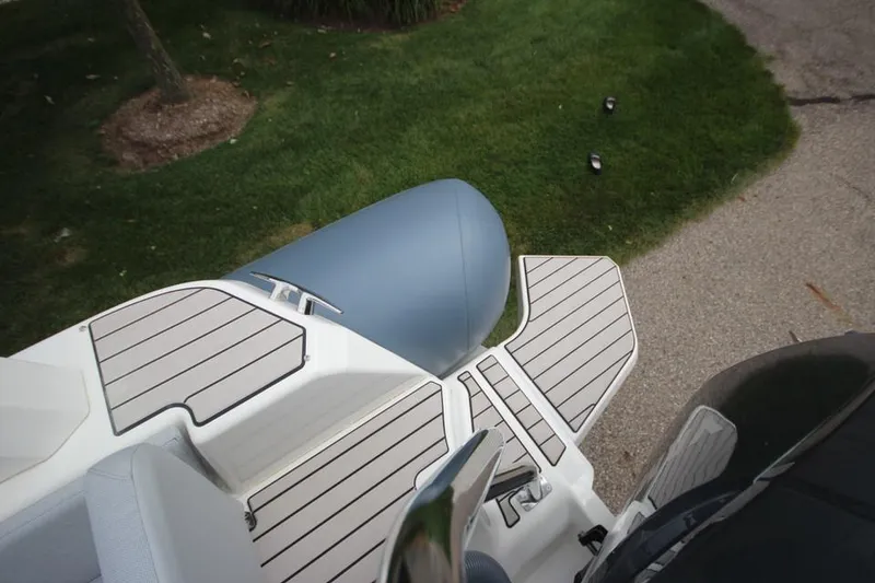 Slide: The Image of 2024 Zodiac Medline 7.5 NEO 300hp boat with sleek deck design. - 7