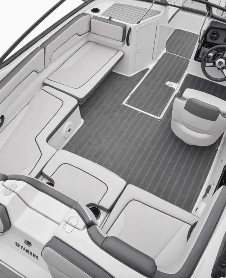 Slide: The Image of 2023 Yamaha Boats SX195 interior, spacious seating and modern design. - 6