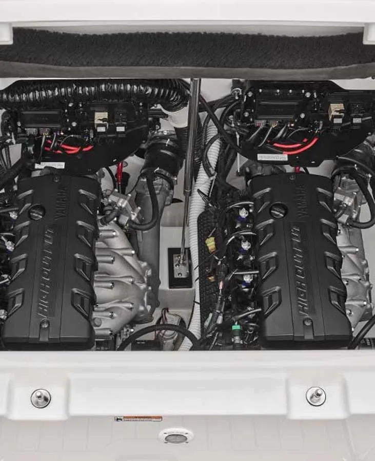 Slide: The Image of 2023 Yamaha Boats 222S engine compartment with twin engines. - 7