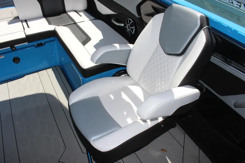 Slide: The Image of 2023 Yamaha Boats 255XE interior seating with modern design and premium materials. - 8