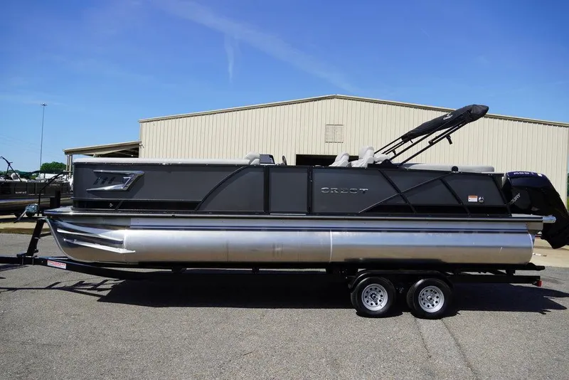 Slide: The Image of 2024 Crest Caribbean LX 250 SLC pontoon boat on a trailer. - 3