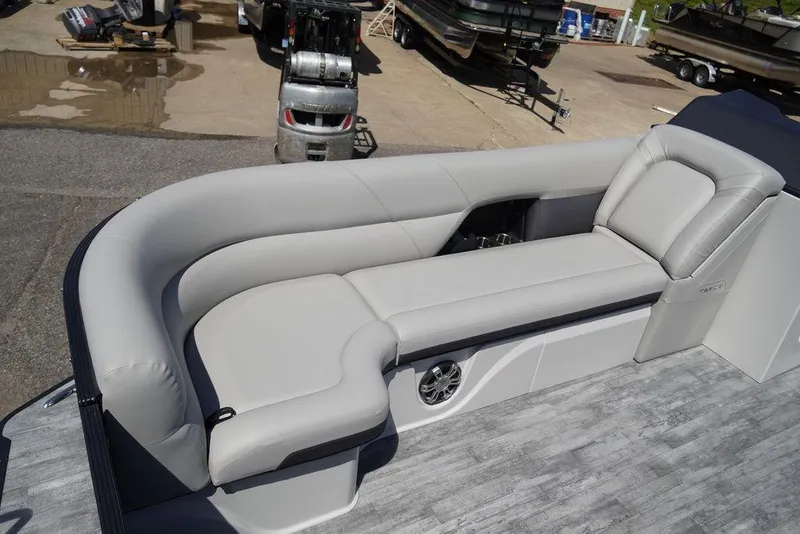 Slide: The Image of 2024 Crest Caribbean LX 250 SLC boat with luxurious seating and modern design. - 5