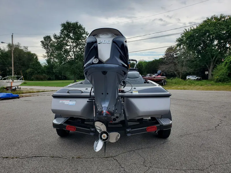 Slide: The Image of 2023 Skeeter ZX200 boat rear view with outboard motor. - 6