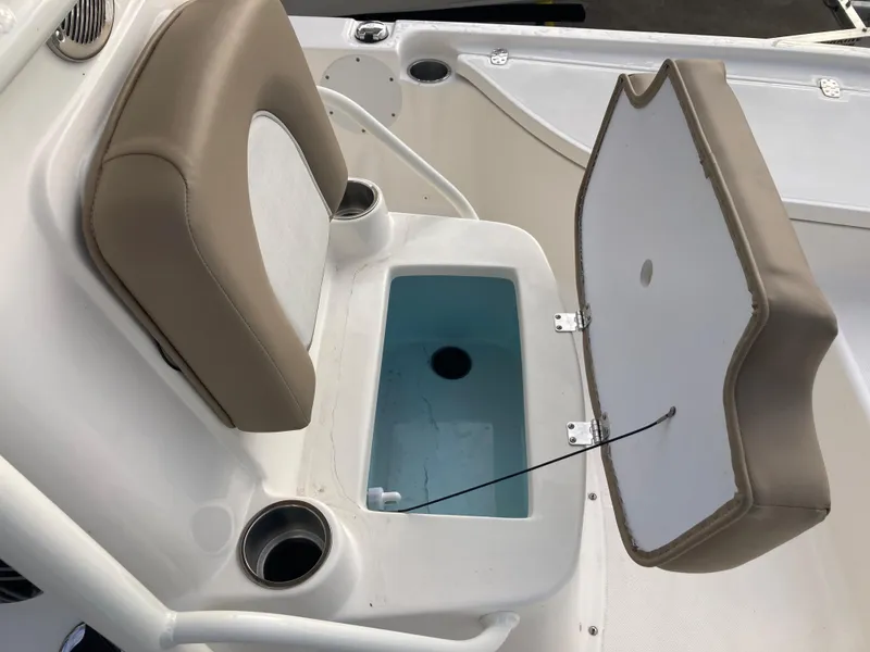Slide: The Image of 2024 Sea Born FX21 boat seat with open storage compartment. - 10