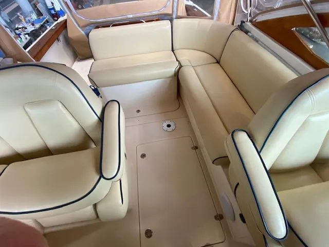Slide: The Image of 2009 Hunt Yachts Harrier 29 dashboard with steering wheel and navigation instruments. - 3