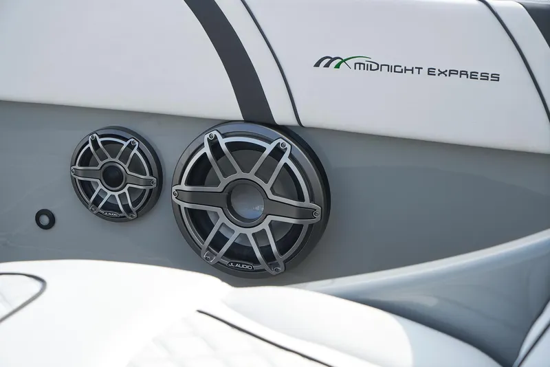 Slide: The Image of Close-up of 2021 Midnight Express 43' Open boat speakers. - 11