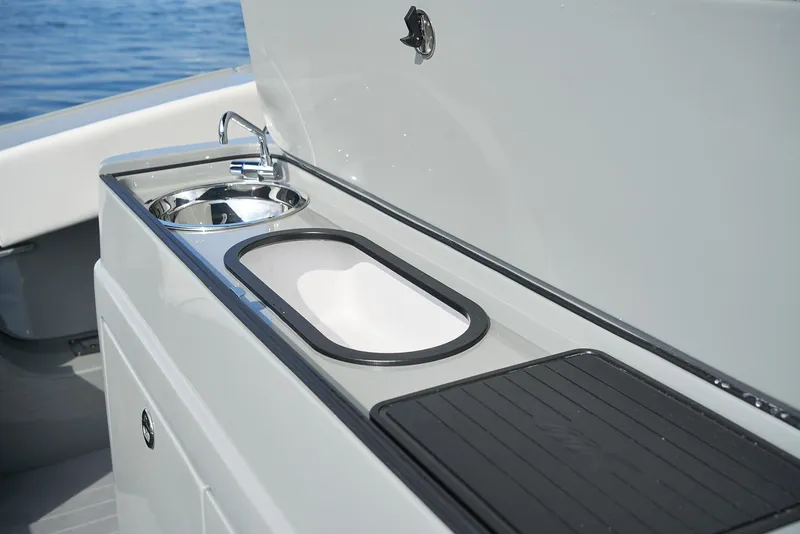 Slide: The Image of 2021 Midnight Express 43' Open boat sink and countertop detail - 12