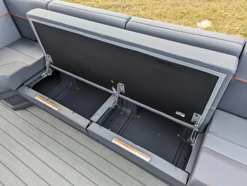 Slide: The Image of 2024 Manitou Explore 22 MAX w/150 Rotax under-seat storage compartment. - 14