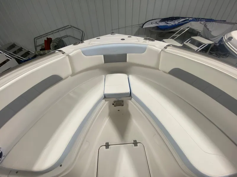 Slide: The Image of 2024 Robalo R222 Center Console boat interior, spacious seating area. - 17