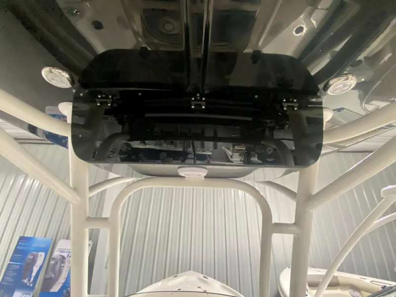 Slide: The Image of 2024 Key West 230 Bay Reef boat interior, view of the T-top and electronics. - 15