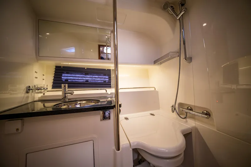 Slide: The Image of Modern bathroom in 2016 Nimbus 305 Coupe with shower, sink, and toilet. - 15