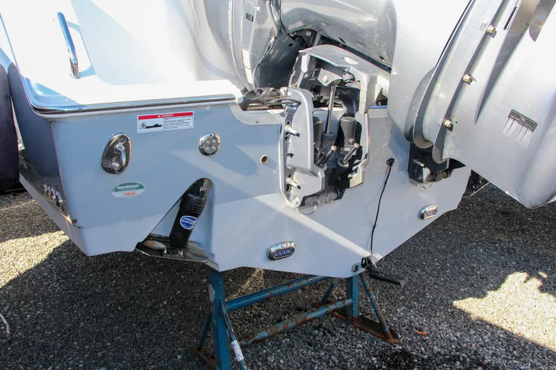 Slide: The Image of 2021 Sea Hunt Ultra 275 SE boat stern with outboard motor. - 10