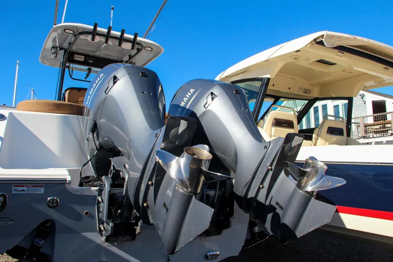 Slide: The Image of 2021 Sea Hunt Ultra 275 SE with twin Yamaha outboard engines. - 11
