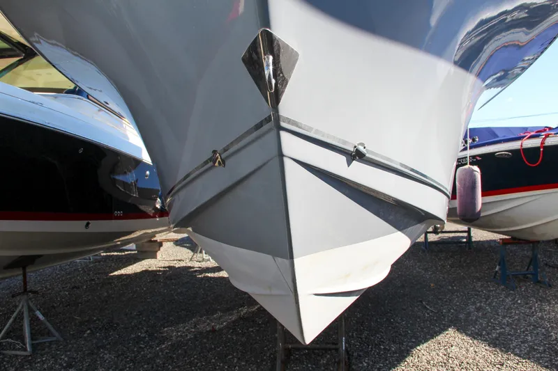 Slide: The Image of 2021 Sea Hunt Ultra 275 SE boat bow view in storage. - 5