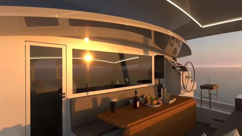 Slide: The Image of 2024 Catamaran Cruisers Power Cat interior at sunset with dining area and helm. - 6