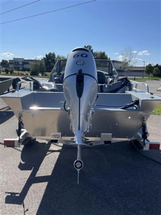 Slide: The Image of 2023 Klamath 18 Open Windshield boat with 60 HP outboard motor. - 2