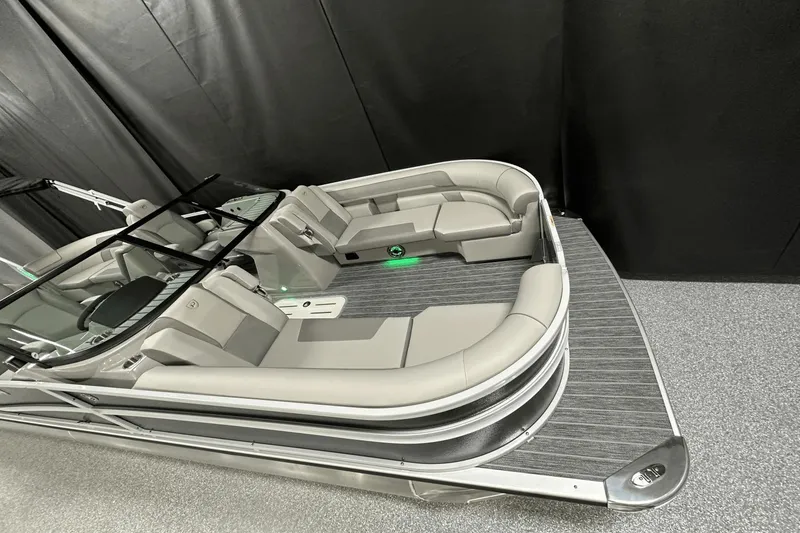 Slide: The Image of 2024 Premier 250 Solaris Sport pontoon boat with sleek seating and modern design. - 14