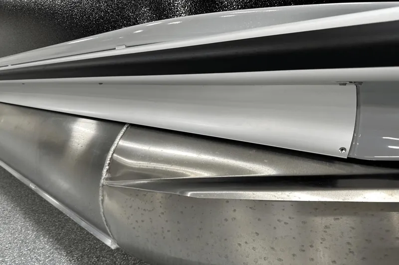 Slide: The Image of Close-up of 2024 Premier 250 Solaris Sport pontoon detail, showcasing sleek metal and design. - 24