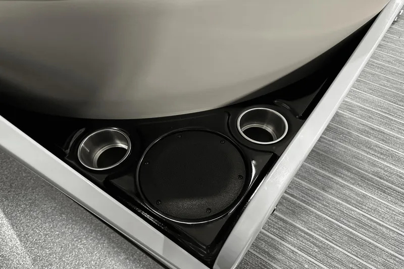 Slide: The Image of 2024 Premier 250 Solaris Sport boat cup holders and speaker detail. - 44