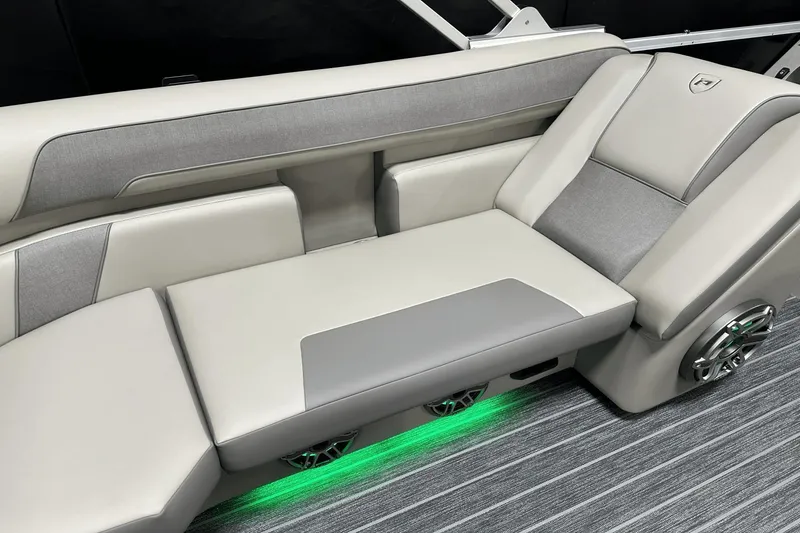 Slide: The Image of 2024 Premier 250 Solaris Sport interior with sleek seating and ambient lighting. - 48