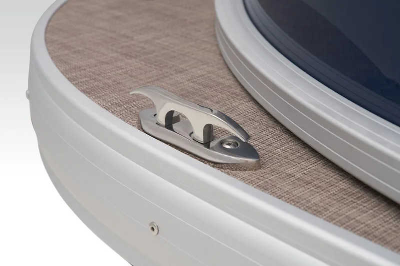 Slide: The Image of Close-up of 2024 Sun Tracker Bass Buggy 18 DLX boat cleat on beige deck. - 17