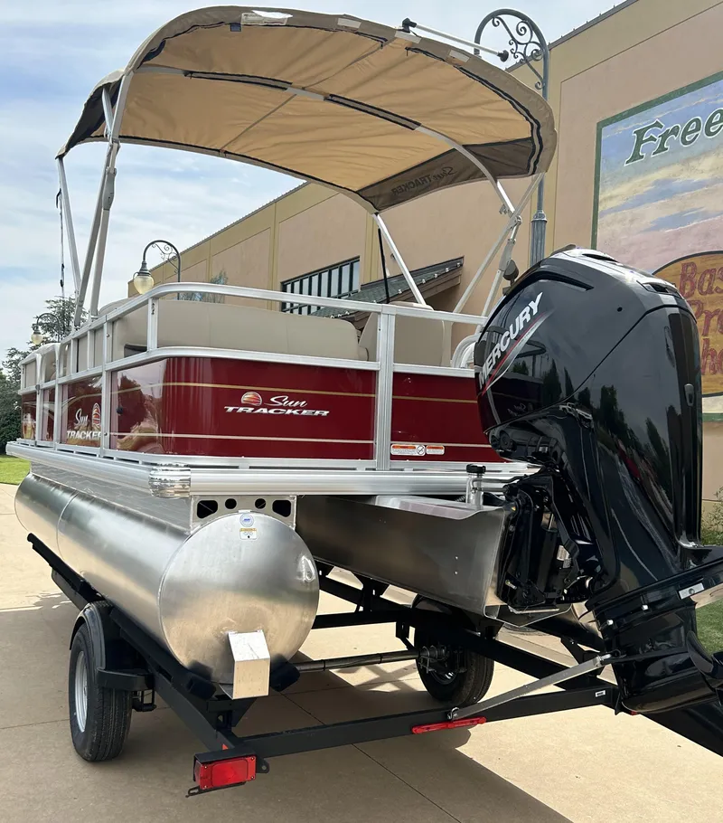 Slide: The Image of 2024 Sun Tracker Party Barge 18 DLX pontoon boat with Mercury engine. - 2
