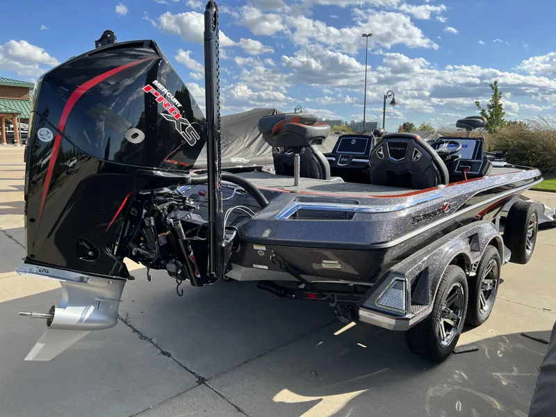 Slide: The Image of 2024 Ranger Z521R Ranger Cup Equipped boat, rear view, parked on pavement. - 3