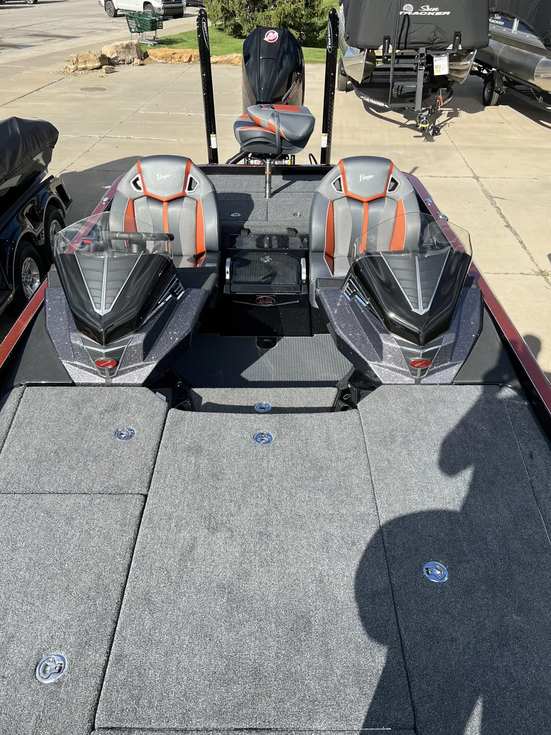 Slide: The Image of 2024 Ranger Z521R Ranger Cup Equipped fishing boat with dual seats and carpeted deck. - 7