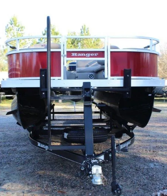 Slide: The Image of 2024 Ranger Reata 200F pontoon boat on trailer, front view. - 2