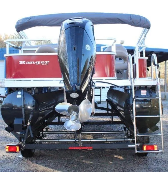 Slide: The Image of 2024 Ranger Reata 200F pontoon boat rear view with outboard motor. - 3